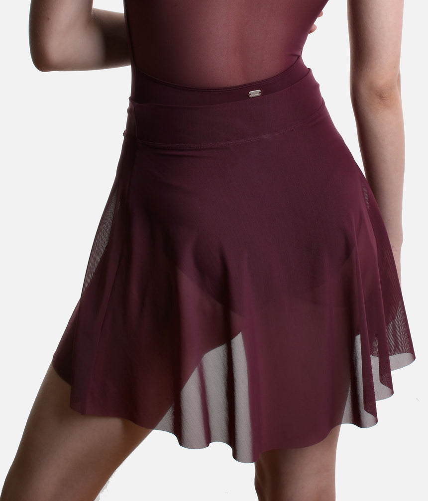 Back detail of the Mirella Adagio mesh skirt in Merlot, showing its sheer fabric, broad waistband and dipped hem.