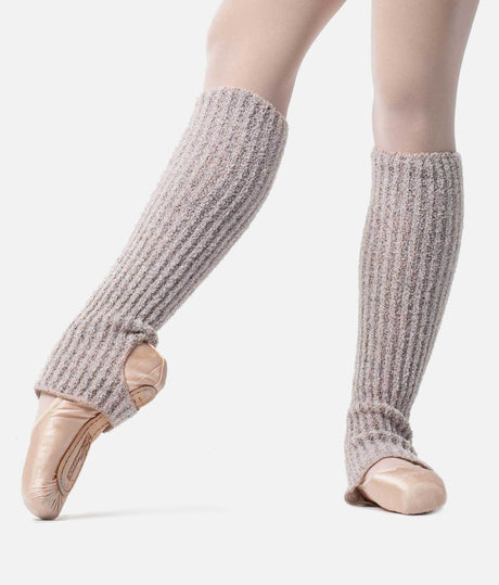 Side view of Intermezzo Prebagui 2015 Pink stirrup legwarmers, with soft ribbed knit extending over the insteps of ballet shoes.