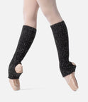 Rear angled view of Intermezzo Prelux 2663 Black metallic legwarmers, showing silver-thread ribbing and heel openings over pink ballet shoes.