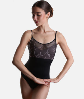 Angled front view of the black Idaira camisole leotard with floral tulle over a sweetheart-shaped front.