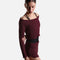 Three-quarter view of the burgundy Intermezzo Ismene ballet warm-up sweater layered over a black leotard.
