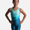 Mondor 7811 Mallard girls’ gymnastics biketard with sweeping aqua and teal panels, a round neckline and short legs.