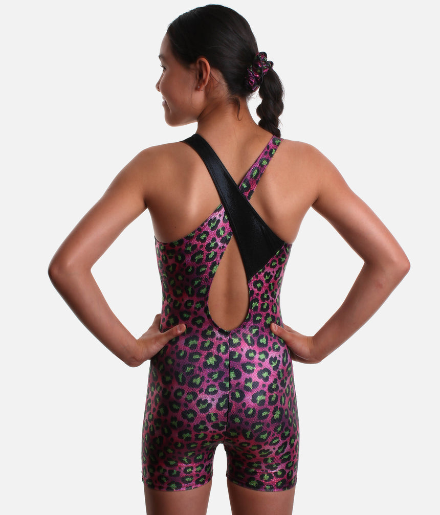 Back of Mondor Cheetah 7826 biketard showing crossed black and printed straps, a teardrop opening, pink animal-print shorts and matching scrunchie.