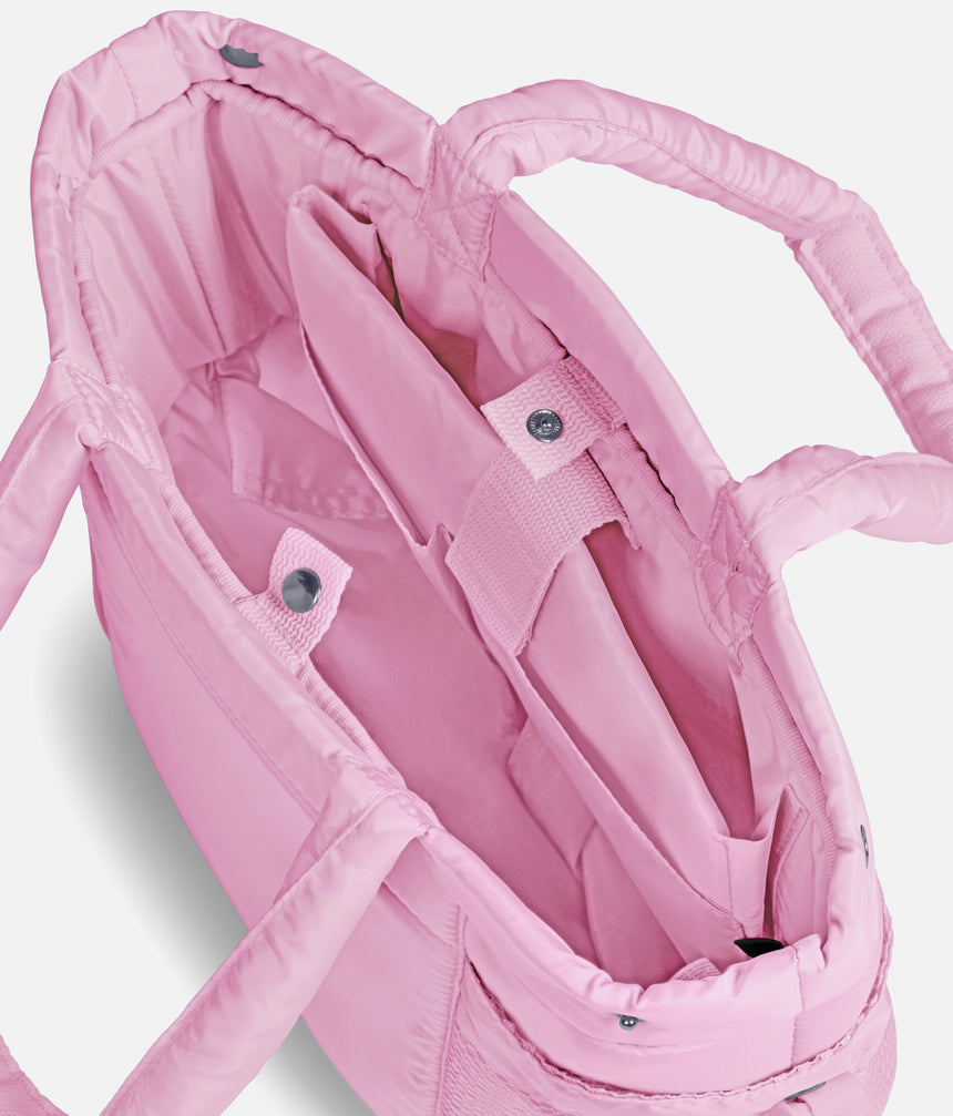 Interior of the BLOCH Petite Studio Dance Bag in Bonbon, showing the padded sleeve, organiser pockets and press-stud fastening.