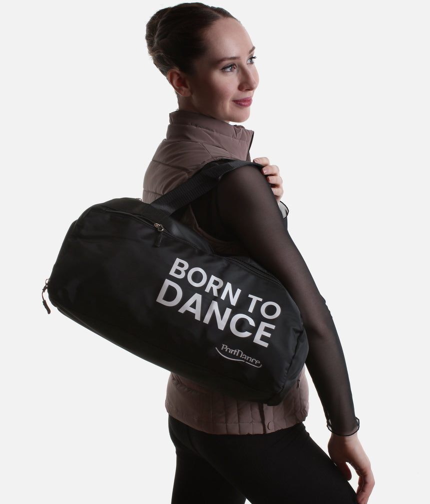 PortDance Born to Dance bag with its zipped side shoe compartment open, showing tan Latin dance shoes inside.