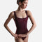 Front view of the wine-toned Mirella Adagio M50010LM tank leotard with a square neckline and matching floral embroidery.