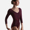 Mirella Adagio M60003LM ballet leotard in Merlot, showing three-quarter sleeves, a V neckline and floral embroidery framing the bodice.