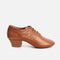 Front three-quarter view of the PortDance PD008 Premium dark tan leather dance shoe with lace-up fastening and a Cuban heel.