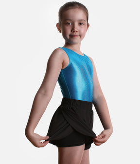 Roch Valley double layered black shorts worn over a leotard, with the curved outer layer lifted to show the closer inner shorts.