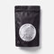 Front of a black resealable Tendu Rock Rosin pouch with a round white ballerina logo label on a white background.