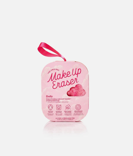 MakeUp Eraser Pink Daily cloth in pink packaging with a ribbon loop and cloud-shaped window showing the soft pink fabric.