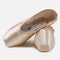 A pair of pink Grishko Pointe Shoes - Maya II Pro with a high tapered vamp, narrow platform, and extended wings. The suede outsole is visible, along with the brand and model information inside the shoe.