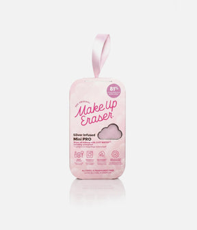MakeUp Eraser Silver Infused Mini PRO in pale pink packaging with a ribbon loop and cloud-shaped window revealing the cloth.
