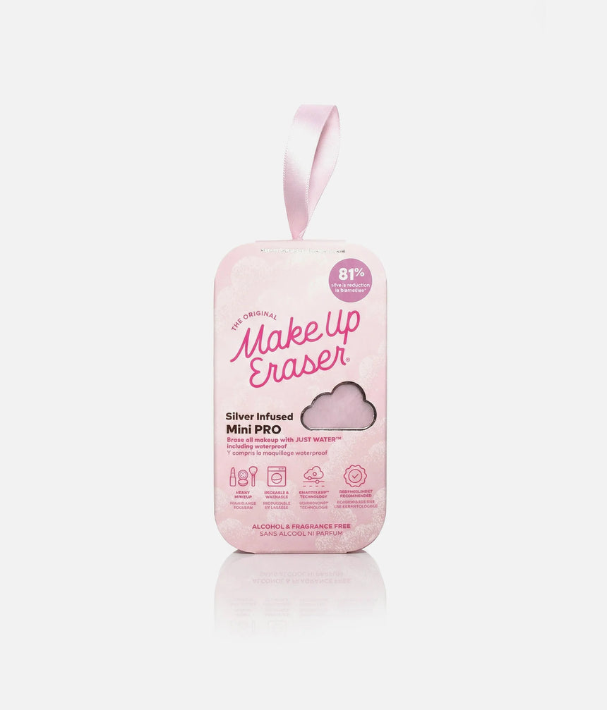 MakeUp Eraser Silver Infused Mini PRO in pale pink packaging with a ribbon loop and cloud-shaped window revealing the cloth.