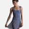 Mirella Adagio MS10005 mesh skirt in Dusty Grey, held out at one side over a matching floral tank leotard.