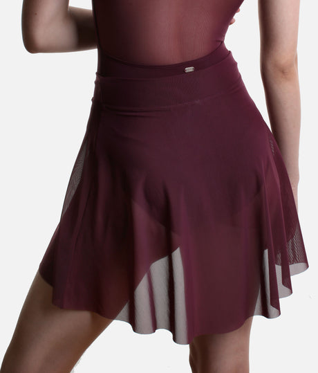 Back detail of the Mirella Adagio mesh skirt in Merlot, showing its sheer fabric, broad waistband and dipped hem.