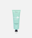 The Smooth Company Smooth Dream 11-in-1 styling cream in a mint-green squeeze tube with a black cap.