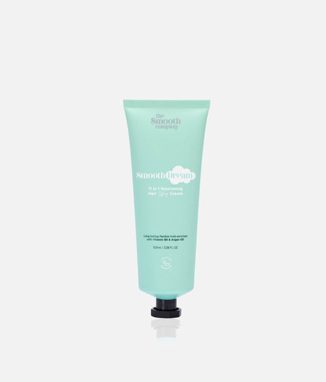 The Smooth Company Smooth Dream 11-in-1 styling cream in a mint-green squeeze tube with a black cap.